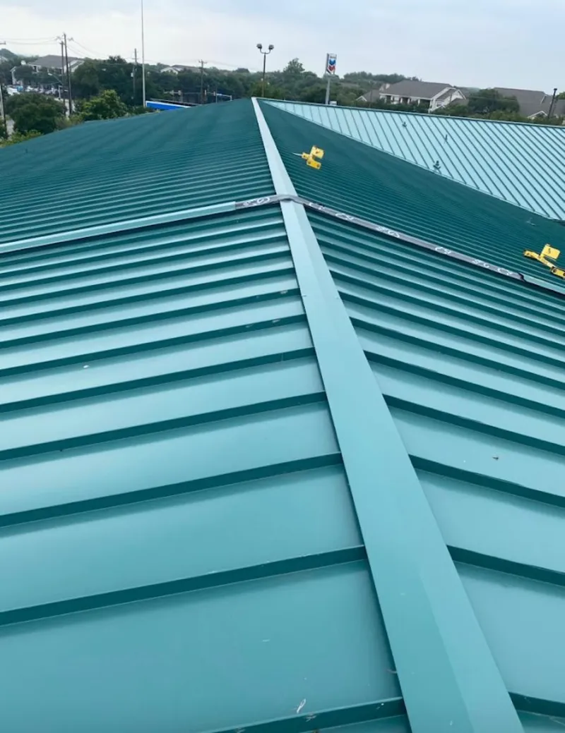 Green commercial metal roof ridge and valley for Metal Roof Repair in Billings